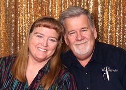 Head shot of two people.